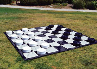 picture of giant checkers board and pieces