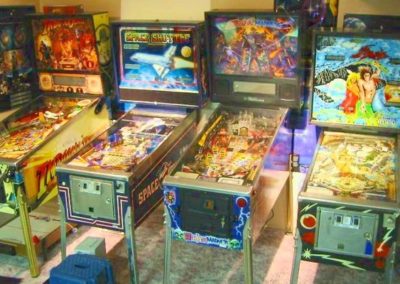 a picture of four pinball machines