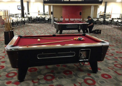 Red cloth covered pool table