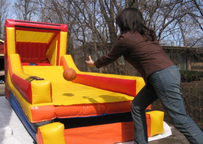 Inflatable skee ball game