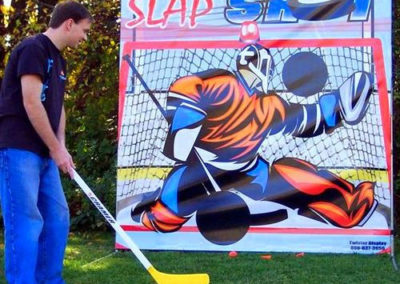 Slap Shot Hockey is a winner at any sporting event, fund raiser, or carnival! Hockey players from the little tikes to the big boys will be lining up to give it a shot.