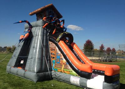 inflatable with spider theme and slide